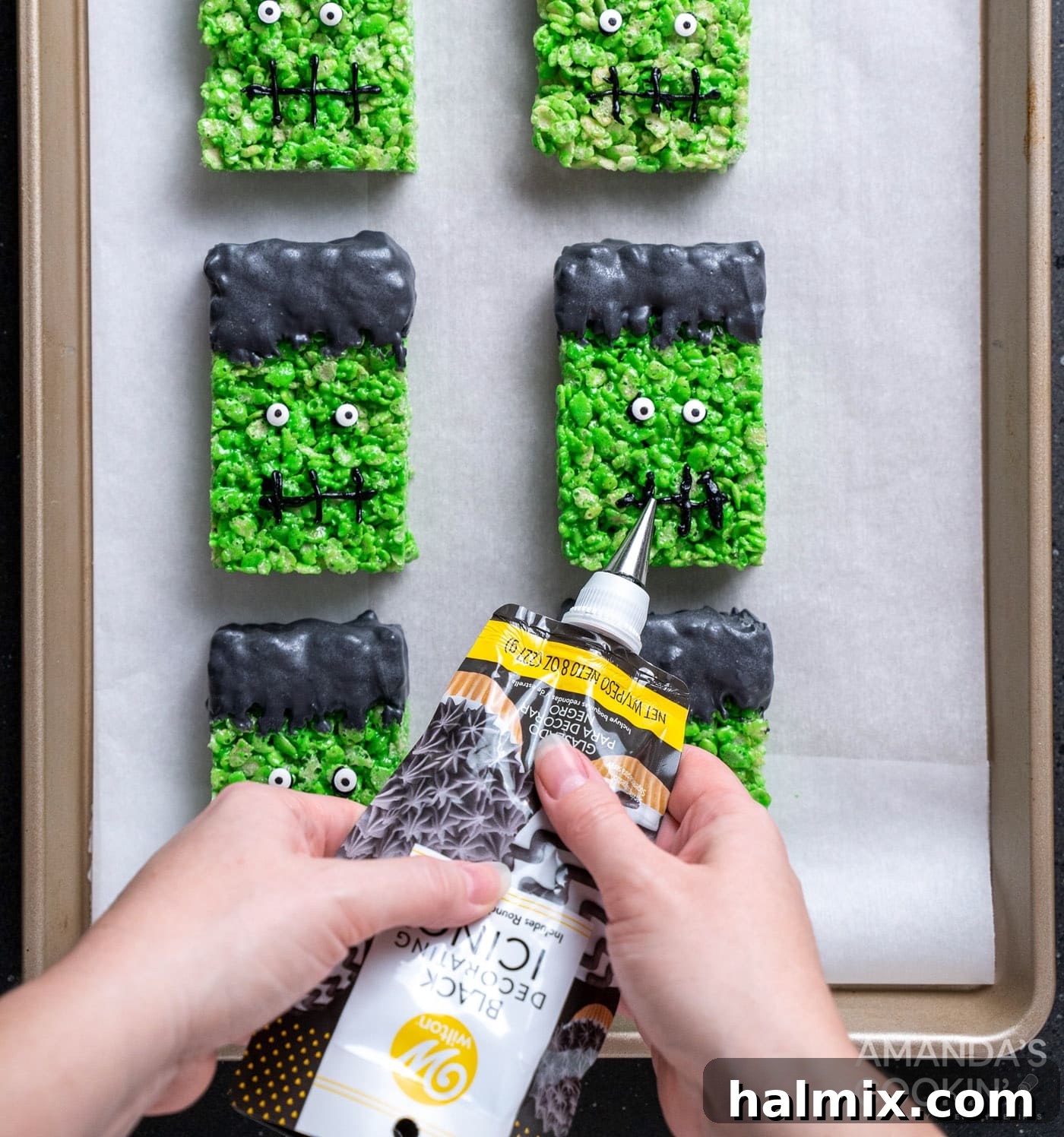 Frankenstein's Krispie Creations 14 Piping on Frankenstein mouths to rice krispie treats