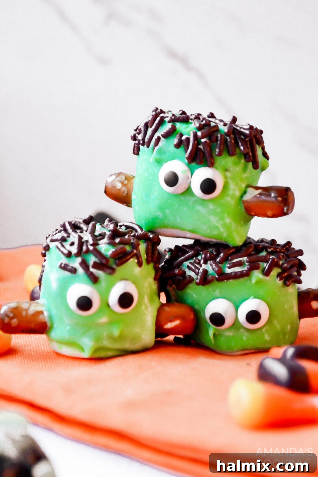 Stacked Marshmallow Frankensteins, a visually appealing no-bake Halloween treat ready for celebration.