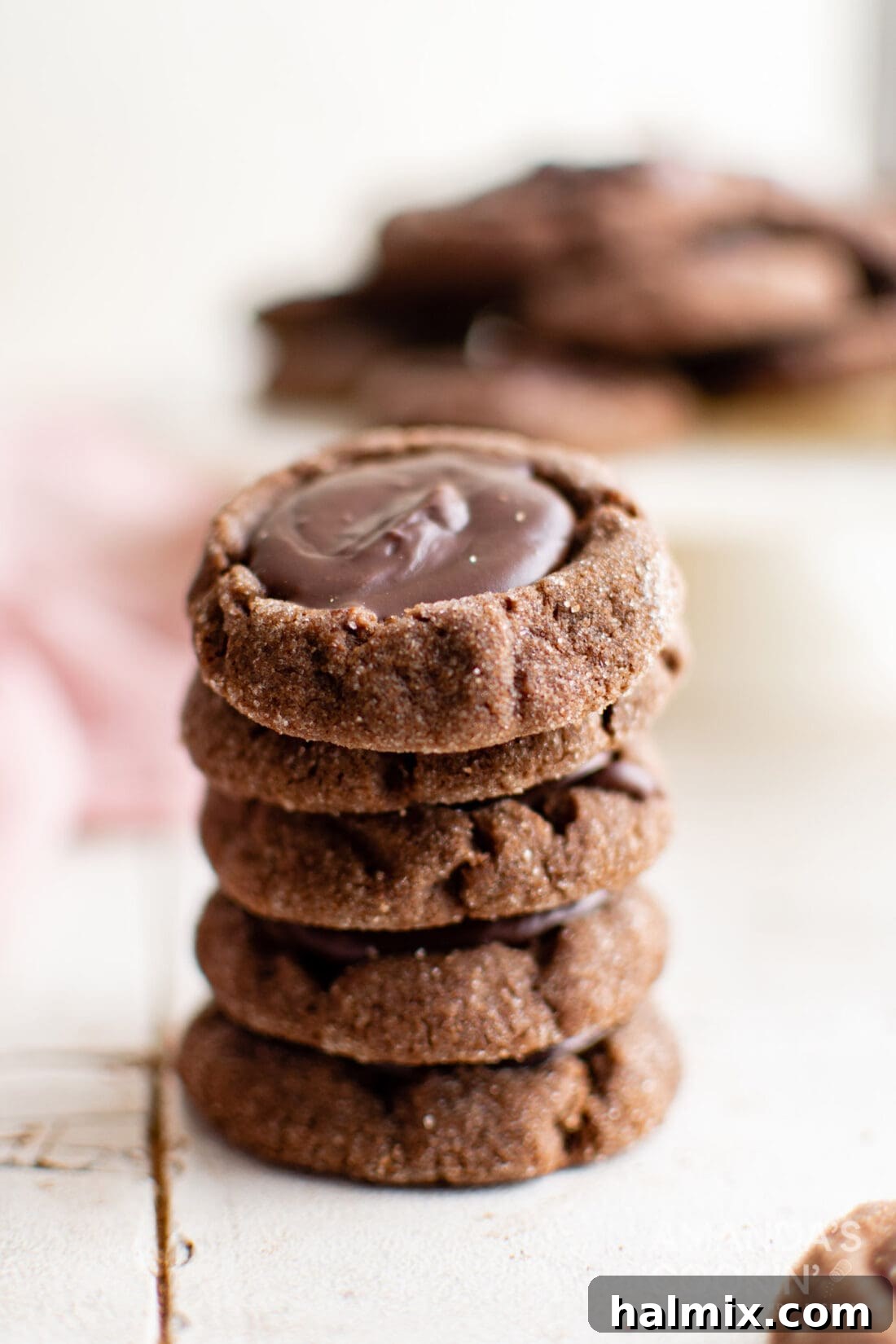 stack of Chocolate Thumbprint Cookies, ready for gifting or enjoying.