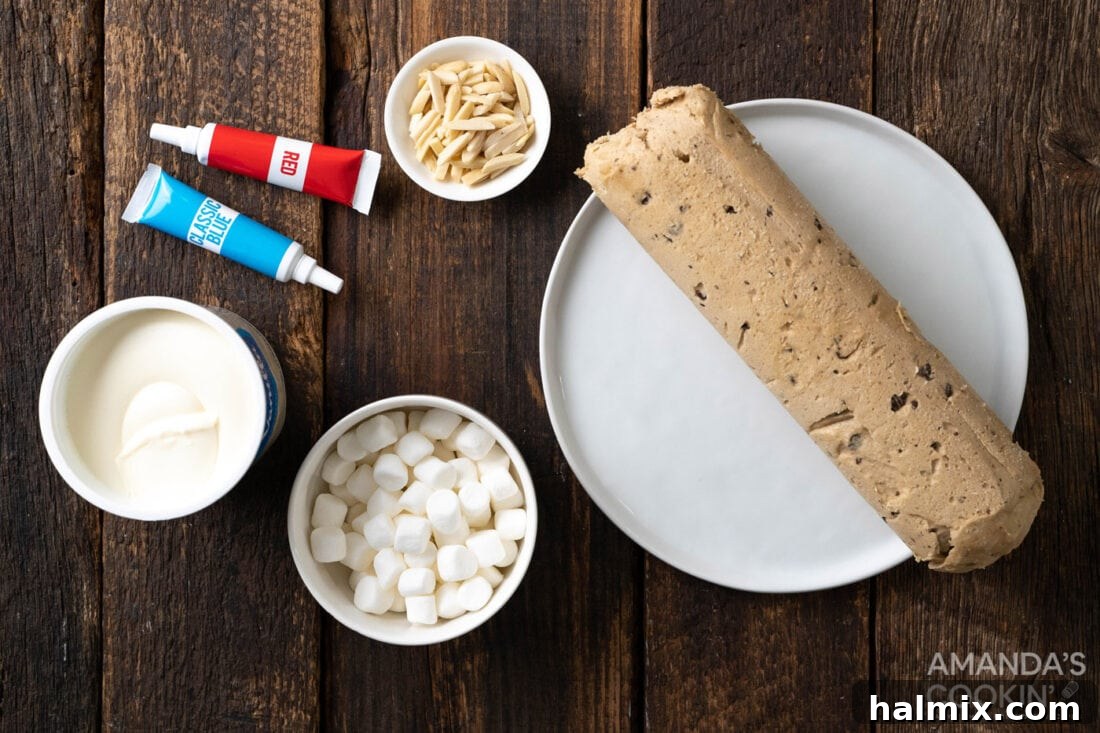 A flat lay of all the simple ingredients required to make Vampire Sandwich Cookies, including cookie dough, marshmallows, almonds, and frosting.