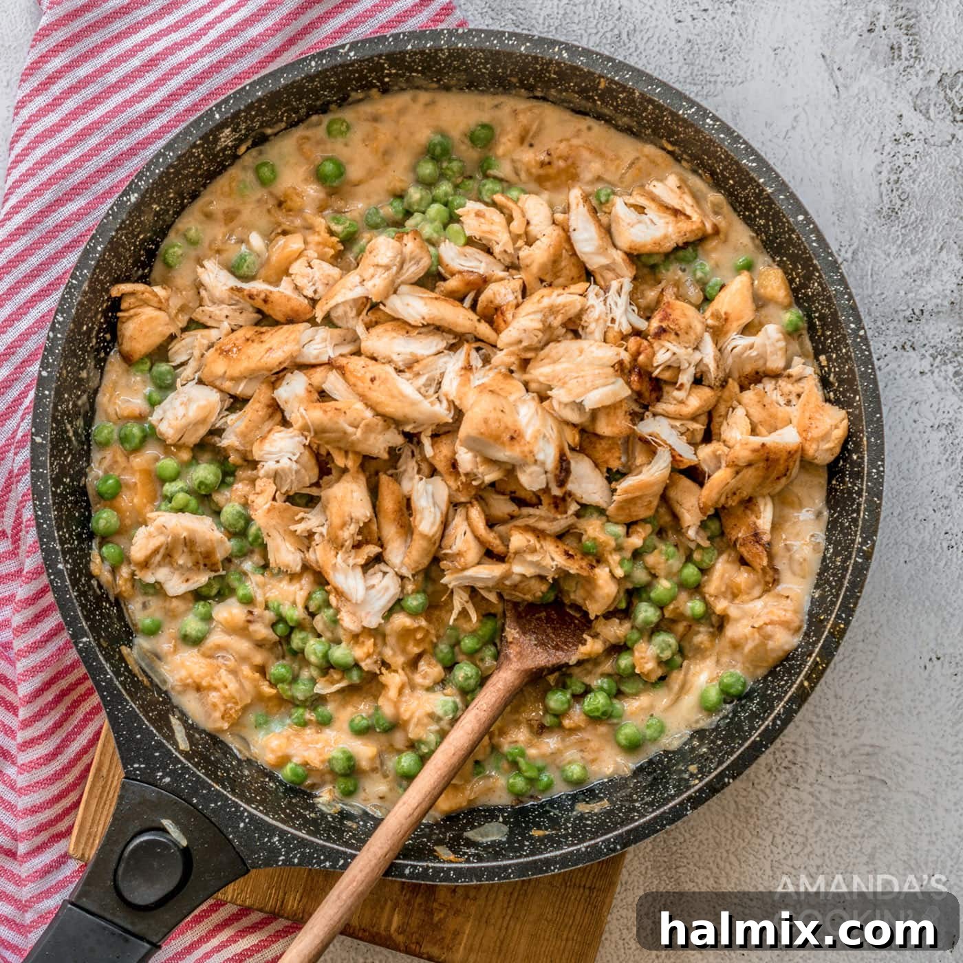 Rich butter, tender pumpkin, and aromatic onion simmering in a skillet, forming the flavorful pot pie base