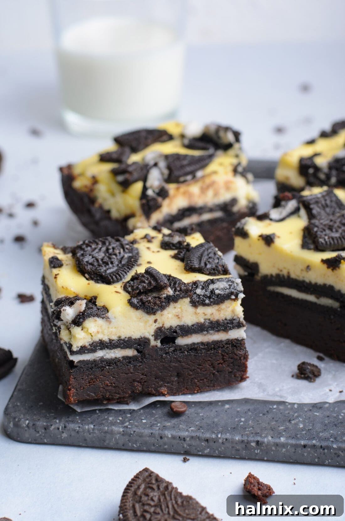 Oreo Cheesecake Brownies on a platter, showcasing rich layers