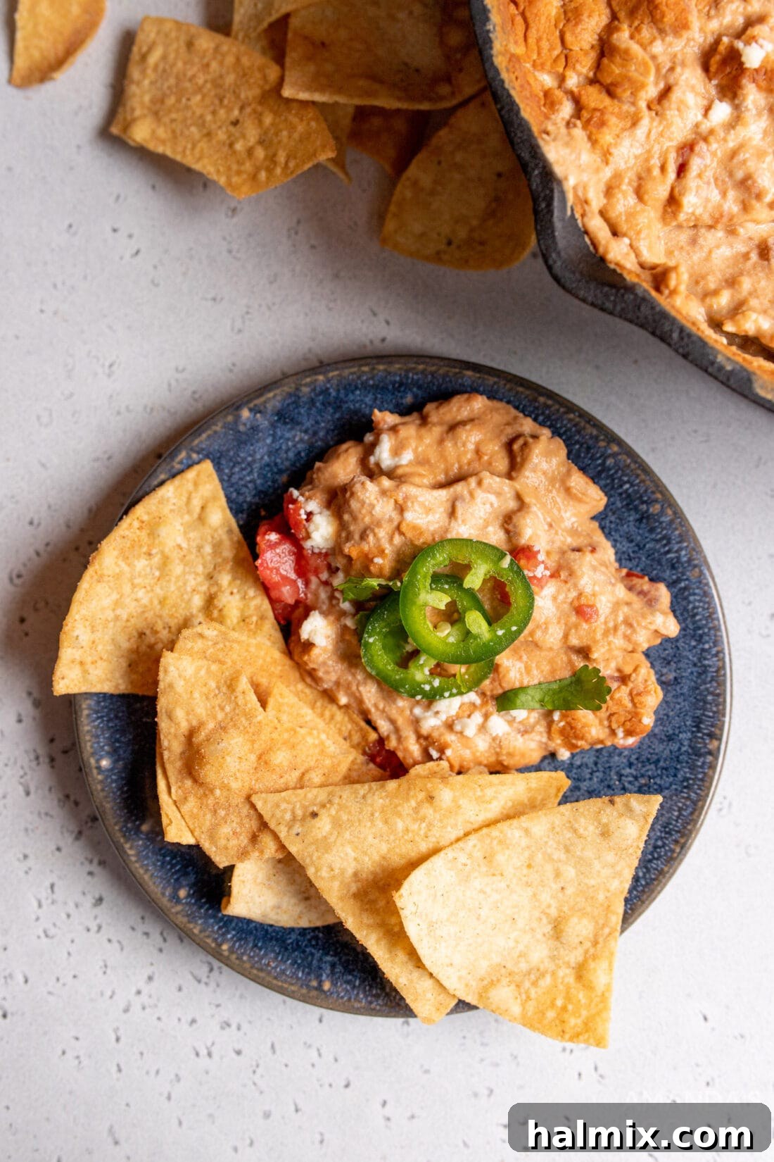 Bean Dip on a plate with cihps