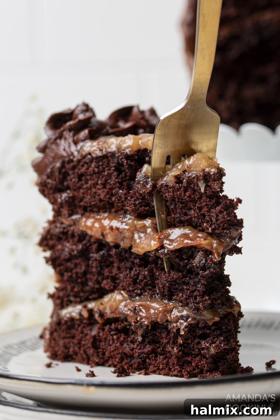 fork in a slice of German Chocolate Cake