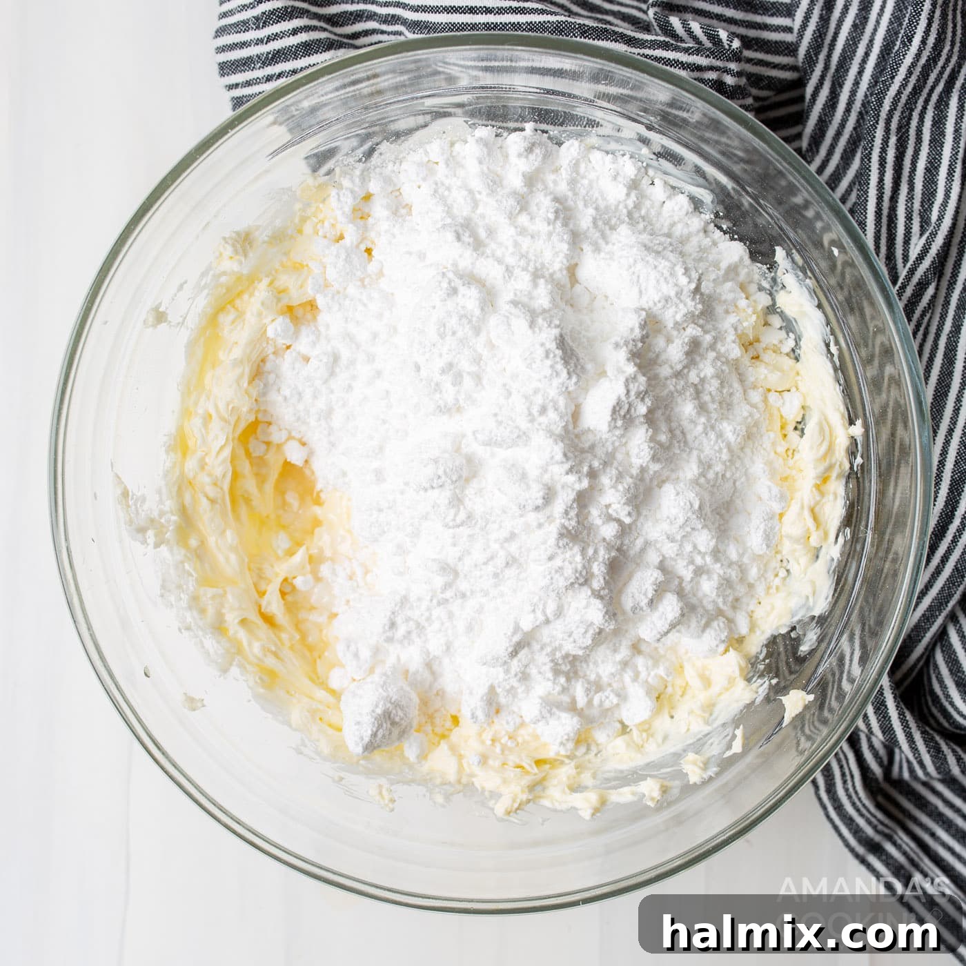 softened cream cheese and butter in a bowl, ready to be creamed for the frosting