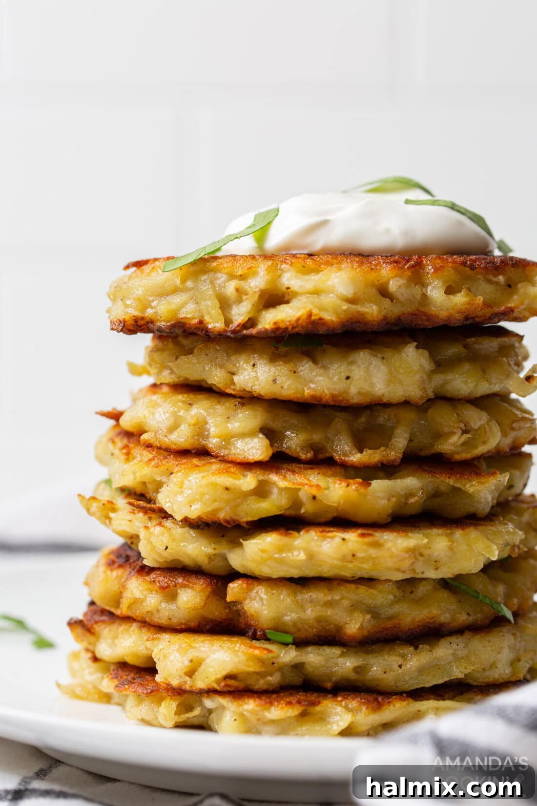 Stack of golden-brown crispy potato pancakes ready to be served