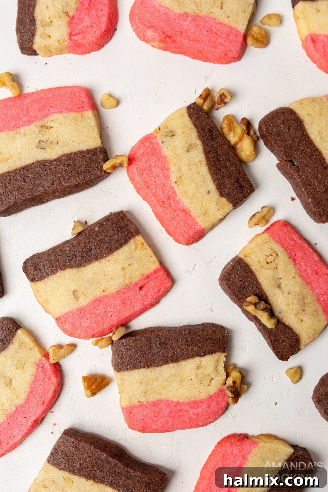 Strawberry Vanilla Chocolate Cookies 2 neapolitan cookies on a white board