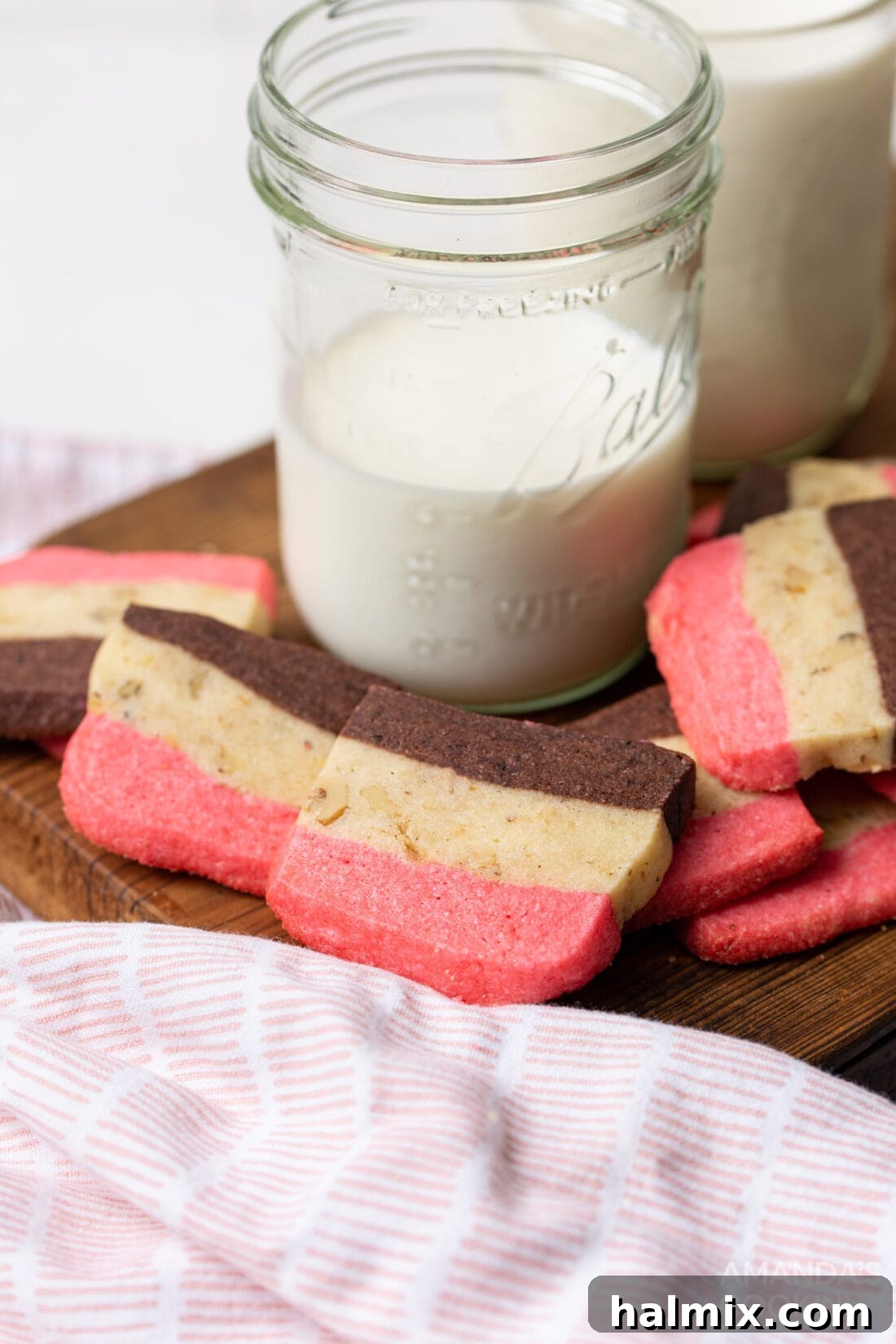 Strawberry Vanilla Chocolate Cookies 8 neapolitan cookies with glass of milk