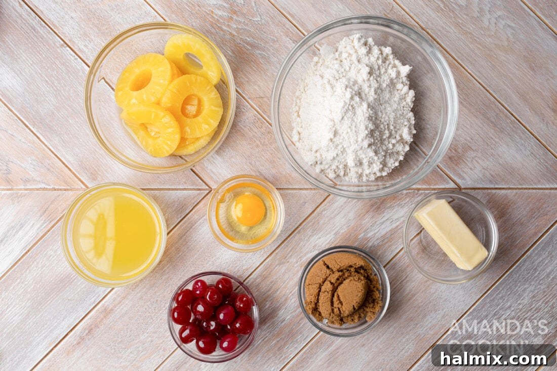 Little Rings of Paradise 4 A collection of ingredients for mini pineapple upside down cakes, including butter, brown sugar, canned pineapple, maraschino cherries, and a box of yellow cake mix.