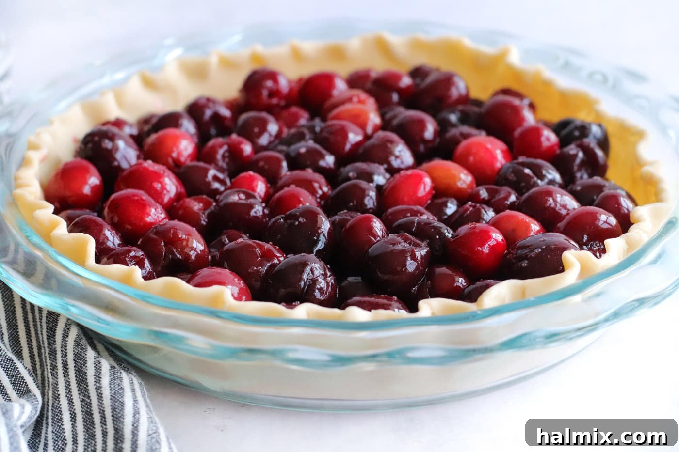 cherry pie filling inside a pan