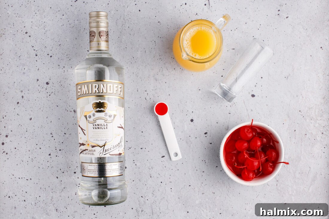 Ingredients laid out for a Pineapple Upside Down Cake Shot: vanilla vodka, pineapple juice, grenadine, and maraschino cherries.