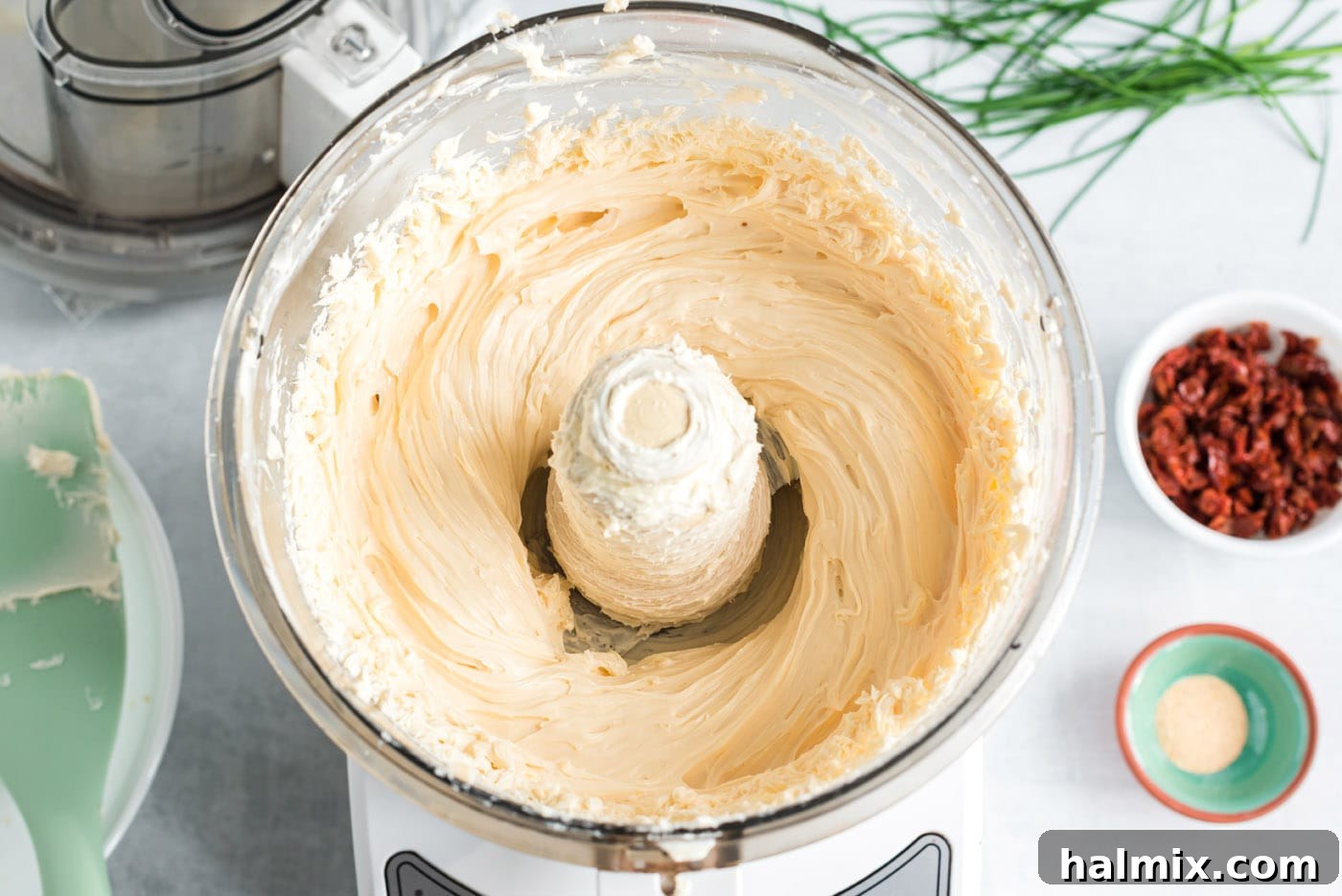 Festive Snowman Cheeseball 5 gouda and cream cheese in a food processor
