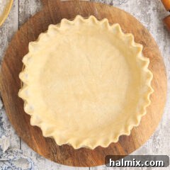Buttery pie crust on a wooden board