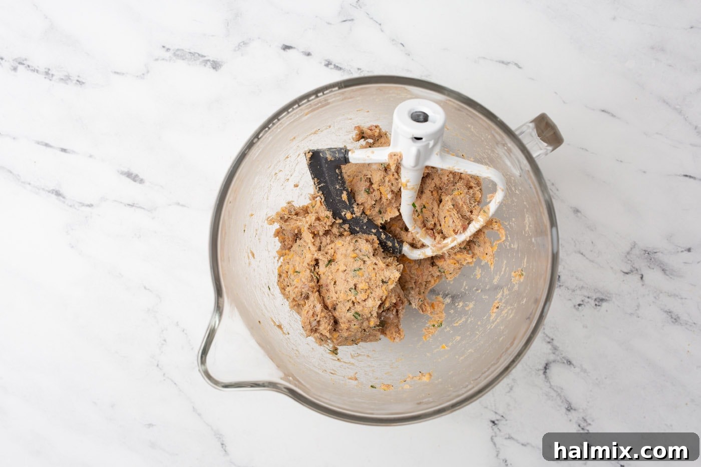 Savory Sausage Bites 6 A stand mixer with a paddle attachment efficiently blending the dense sausage mixture.