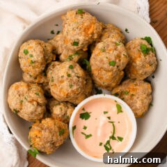 Close-up of baked sausage balls, showing their perfectly browned exterior and inviting texture.