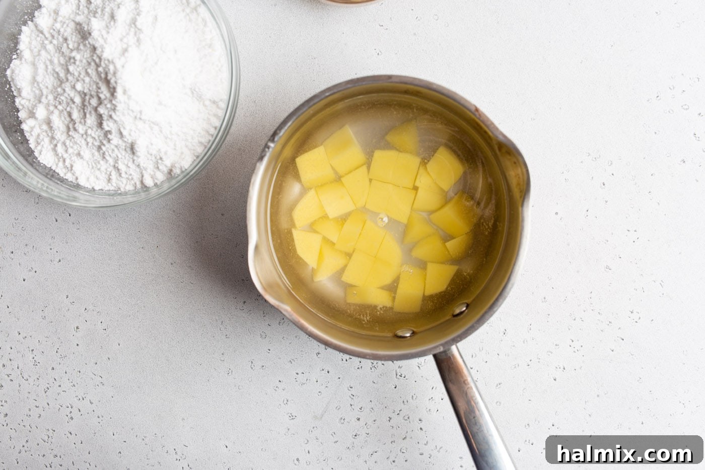 Homestyle Potato Fudge 5 boiling potatoes in a saucepan