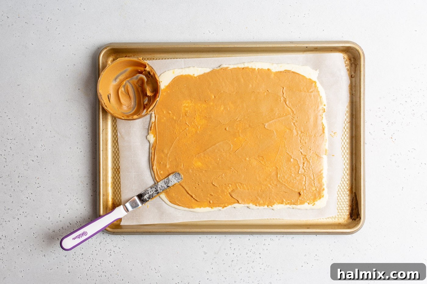 Homestyle Potato Fudge 9 offset spatula smoothing peanut butter on potato dough