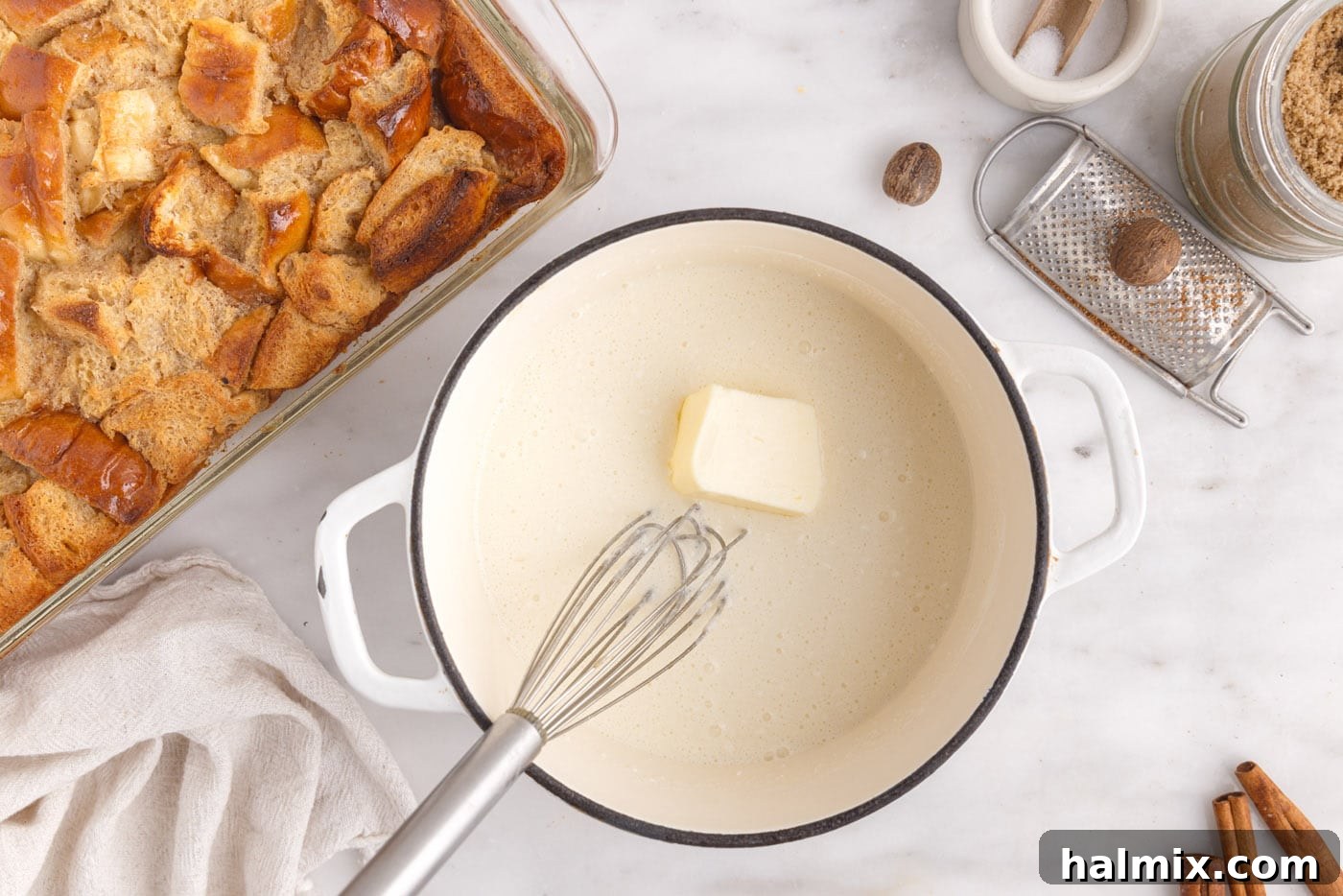 whisking in butter into vanilla sauce