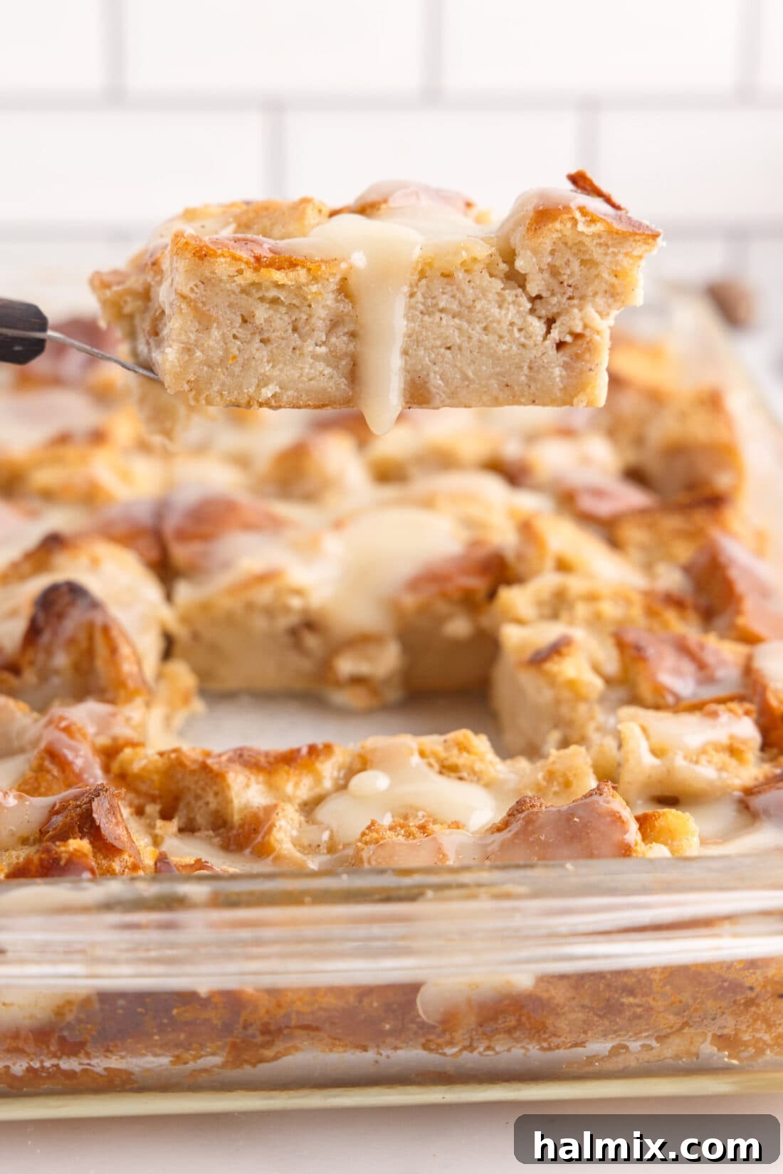 Decadent Bread Pudding Delight 15 lifting a slice of Bread Pudding