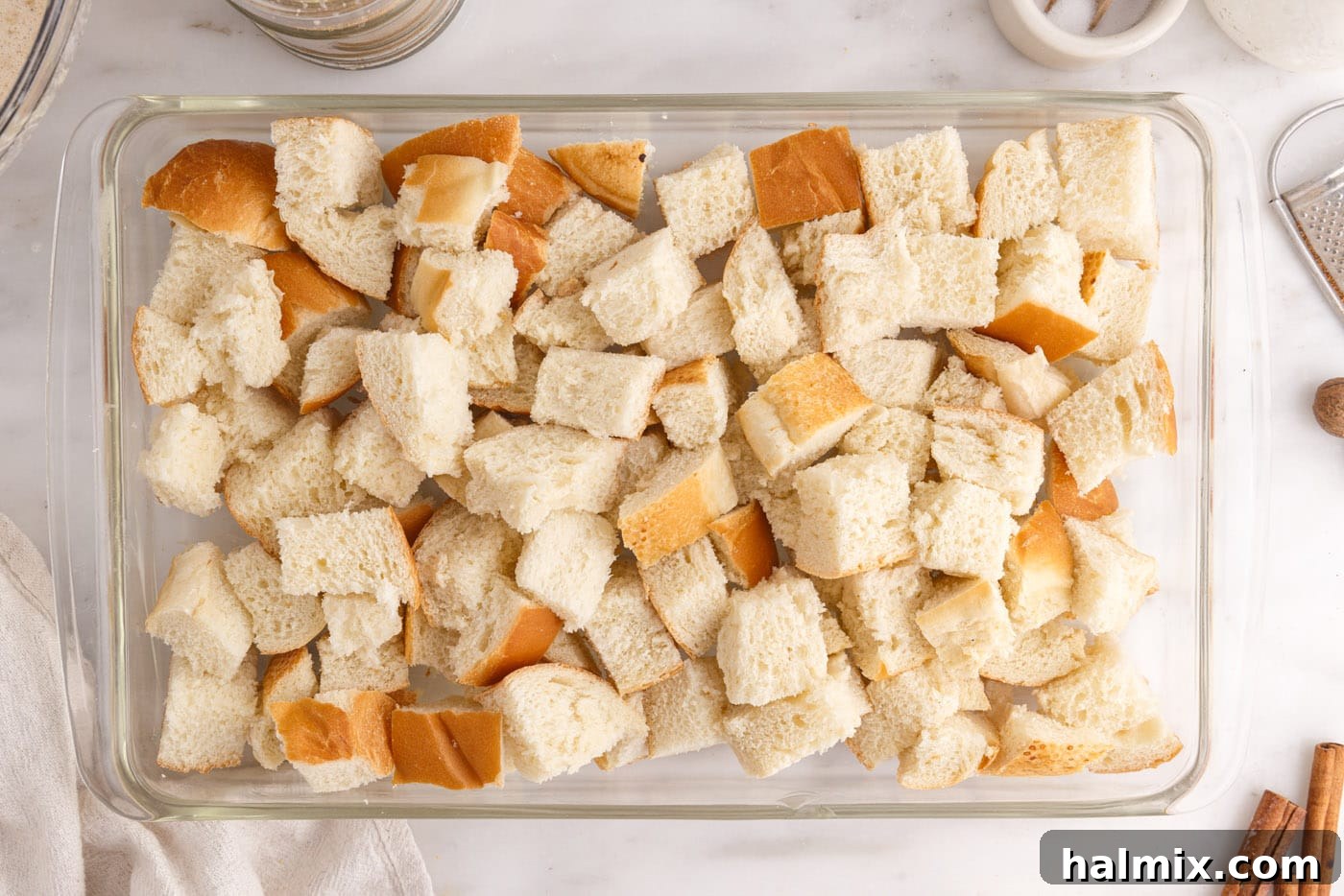 cubed bread in a baking dish