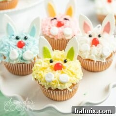 A close up of a bunny decorated cupcakes