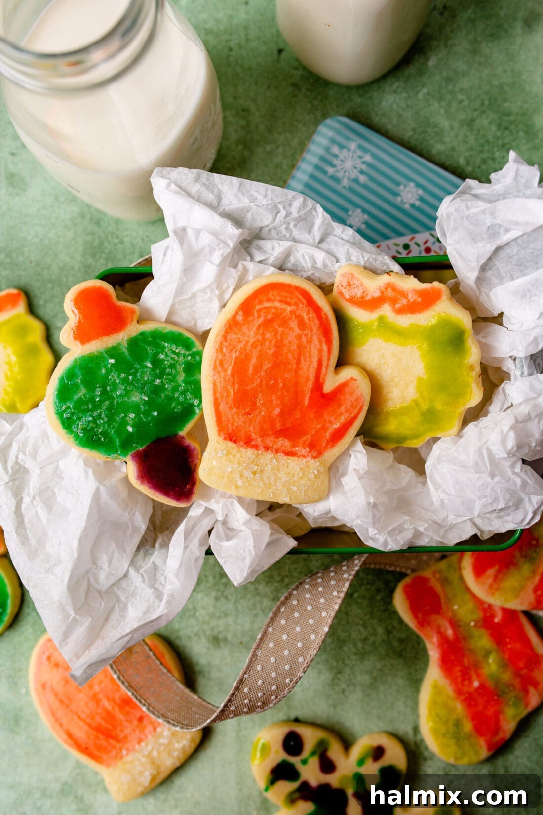 Brushstroke Delights 9 A vibrant assortment of paintbrush cookies beautifully arranged on a tray, showcasing various designs and colors.