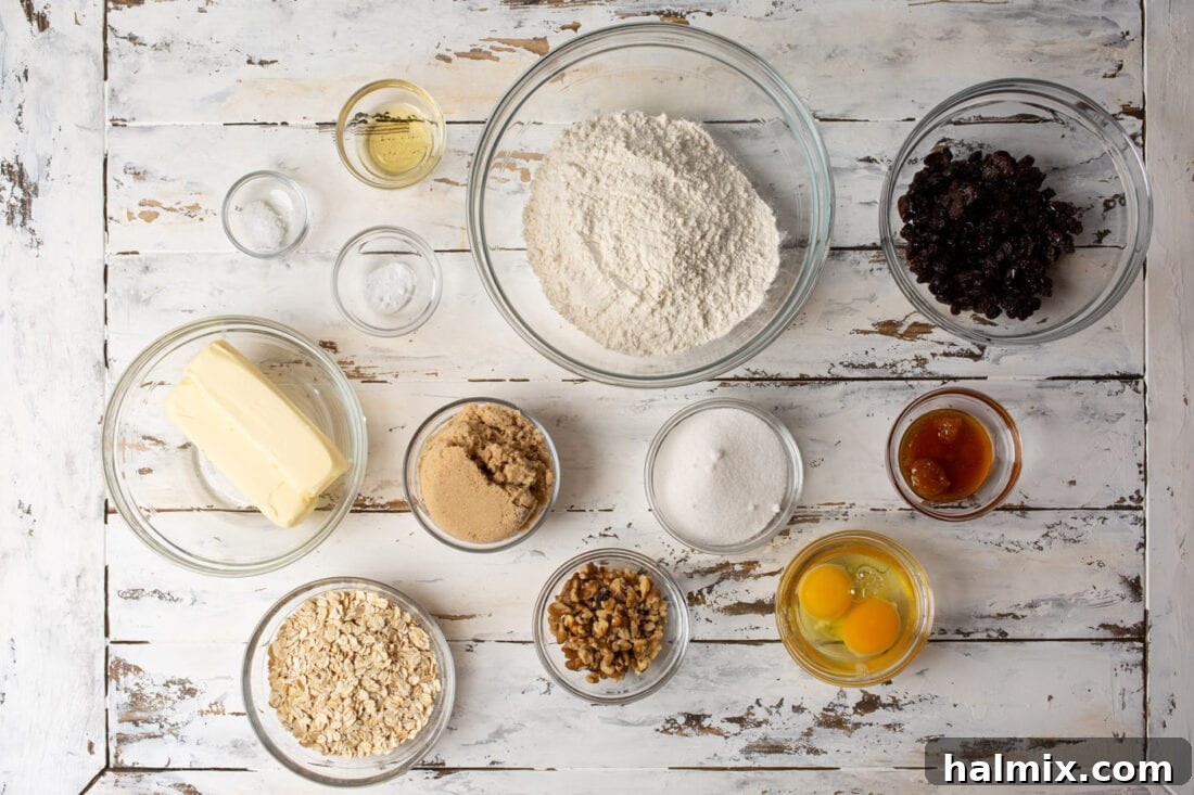 Spiced Oatmeal Raisin Delights 4 ingredients laid out for making oatmeal raisin cookies