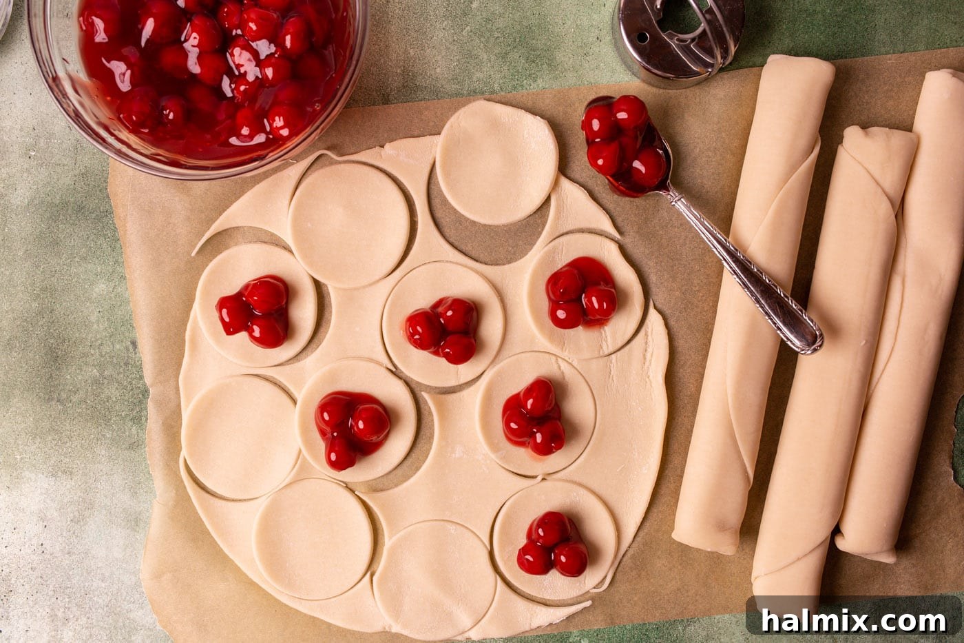cherry pie filling in circles of pie dough