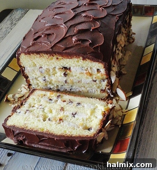 A second view of the exquisite Cassata Cake, showcasing its smooth frosting and inviting texture.