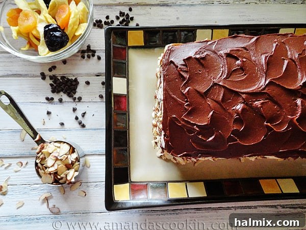 An inviting overhead photo of the finished Cassata Cake, showcasing its beautiful texture and generous topping.