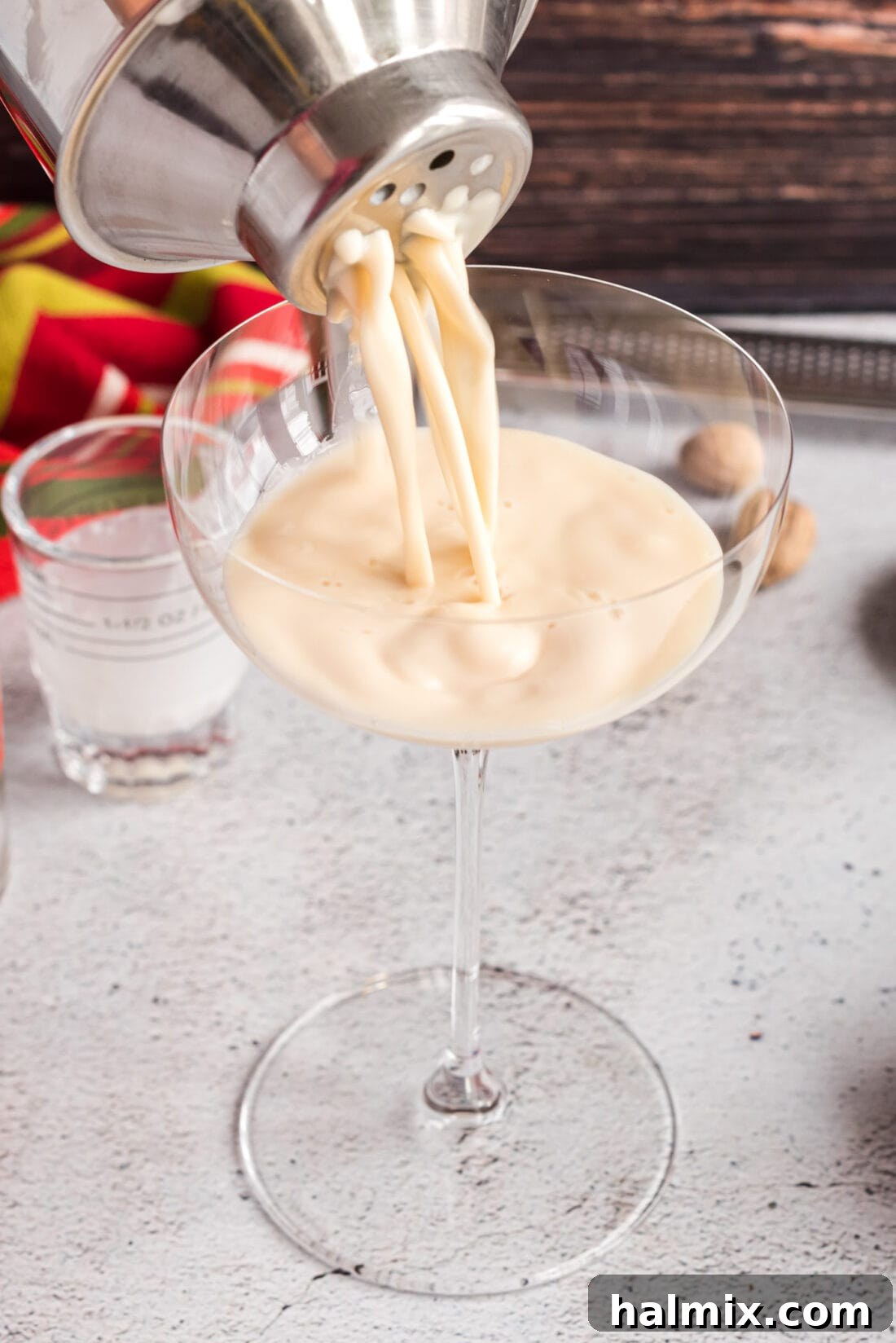 Velvet Brandy Dream 10 straining a Brandy Alexander