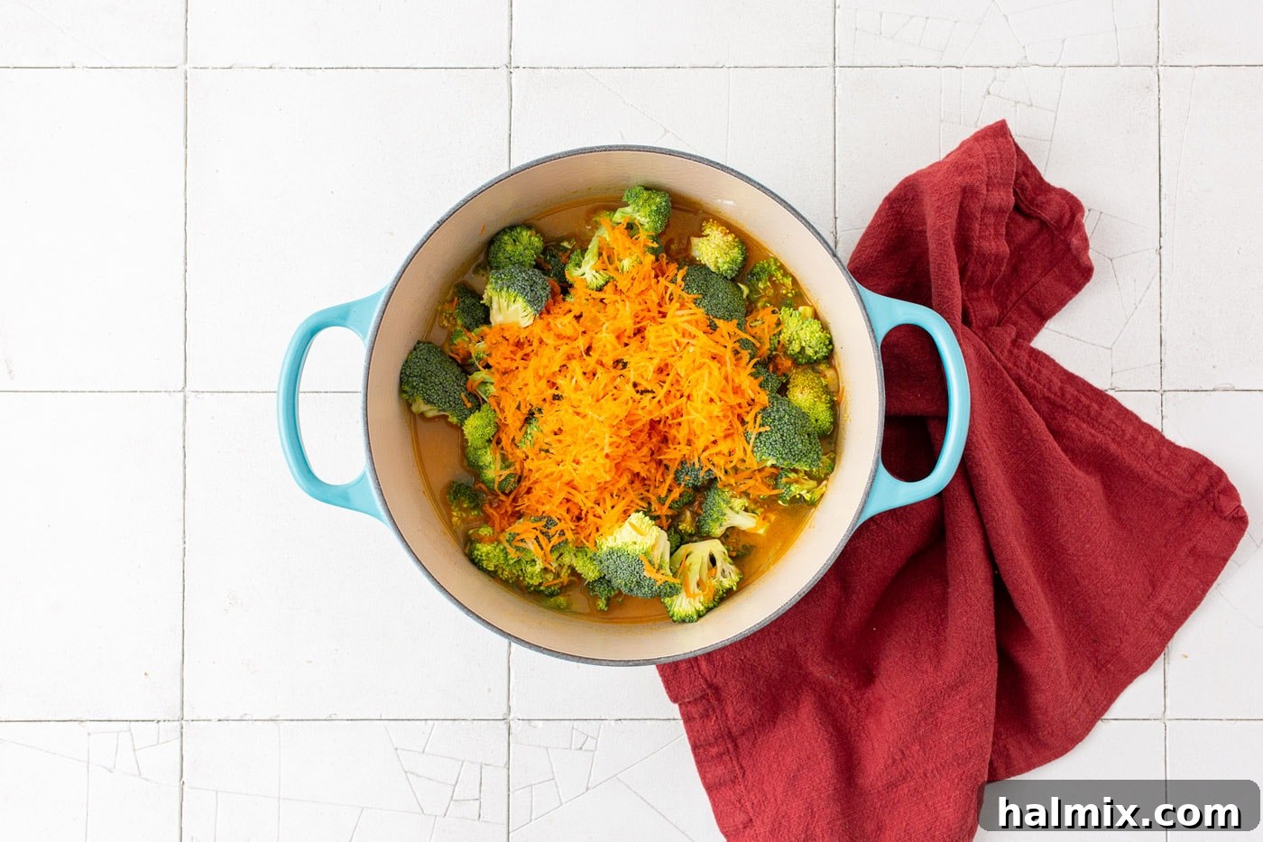 carrots and broccoli florets in a dutch oven 