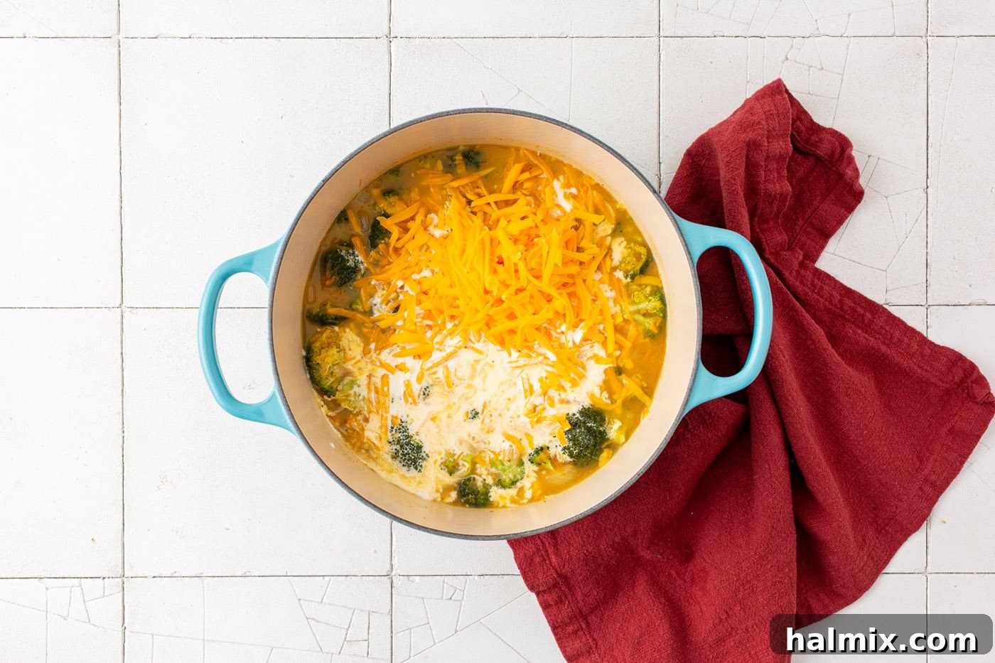 shredded cheddar cheese and half and half added to broccoli cheese soup