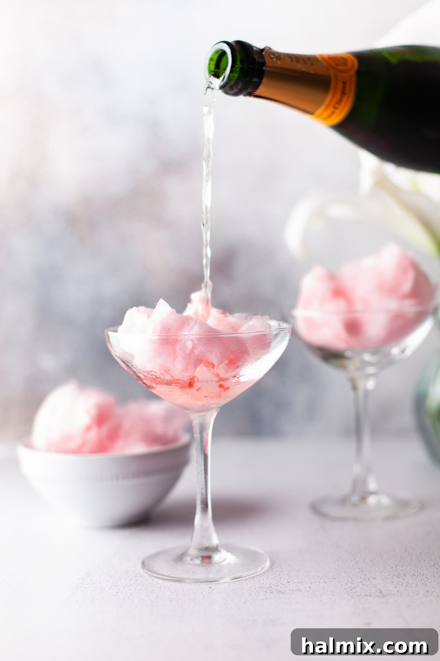 Sweet Cloud Sparkle 5 pouring champagne over cotton candy