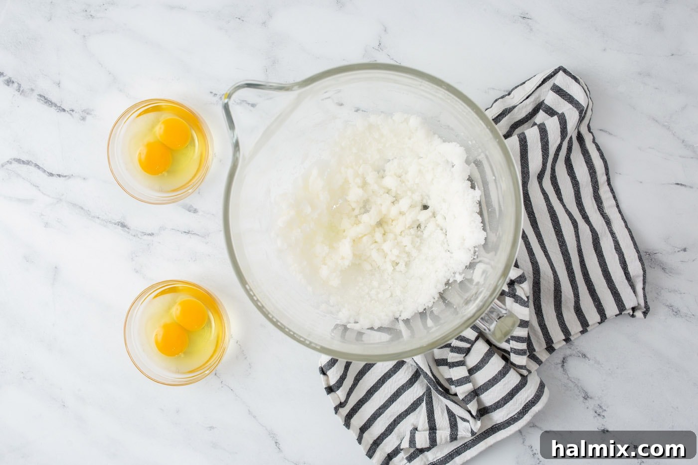 Creamed shortening and sugar in a stand mixer bowl.