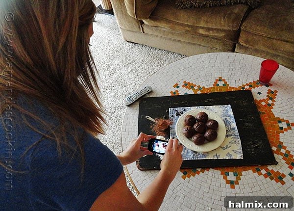 Starbucks Hot Cocoa Chocolate Chip Muffins A young girl happily holding Starbucks Hot Cocoa Chocolate Chip Muffins.