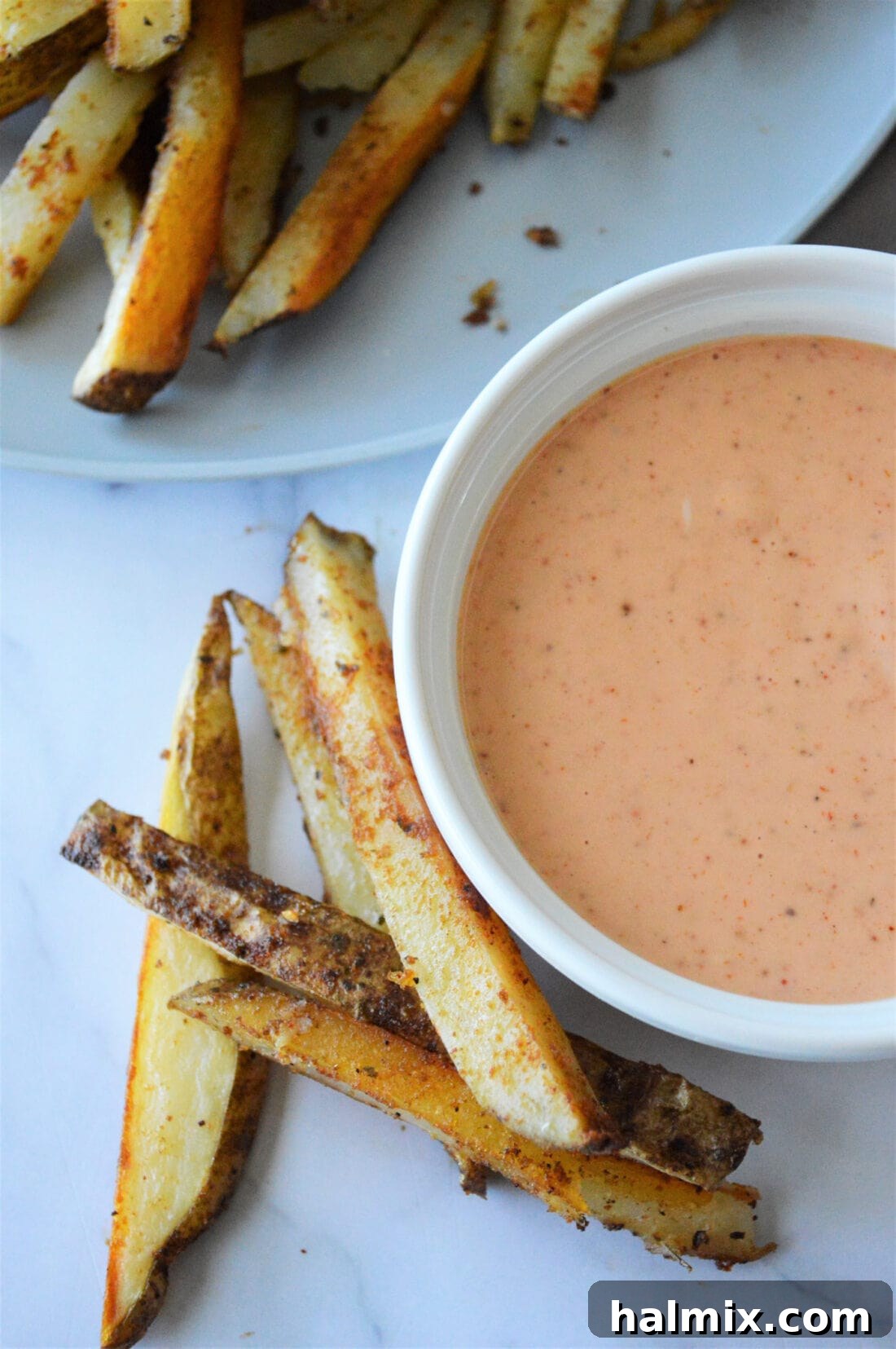 Rich and creamy French Fry Sauce in a white dish, ready for dipping