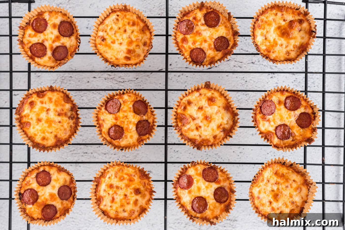 Cauliflower Pizza Poppers 10 baked cauliflower pizza bites on a cooling rack
