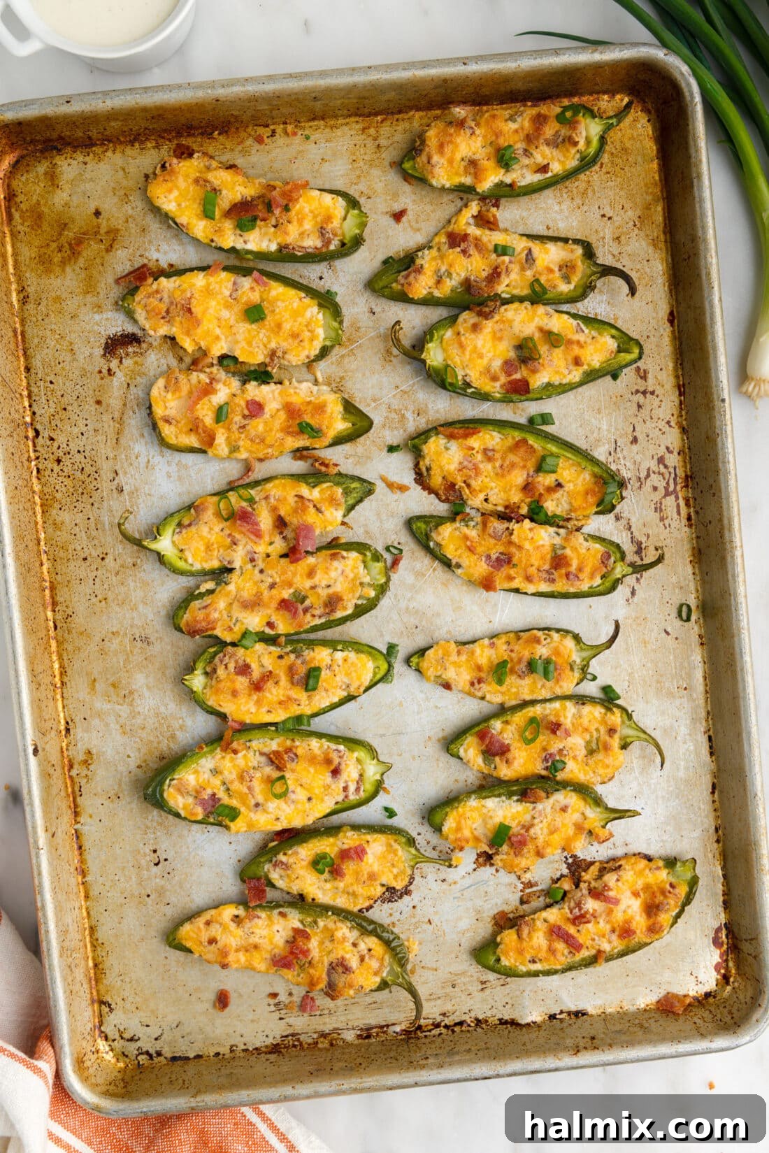 Crispy Firecrackers 3 Jalapeno Poppers on a sheet pan