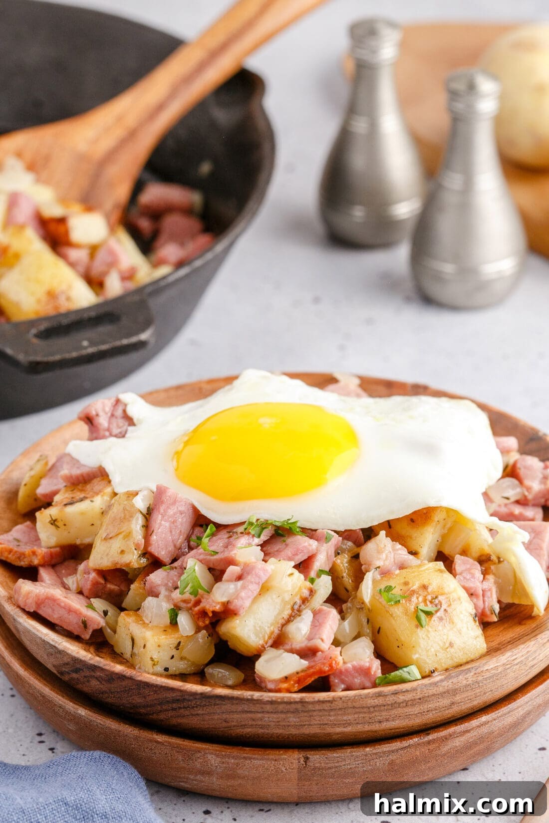Sizzling Corned Beef and Potato Medley 3 Corned Beef Hash topped with a fried egg