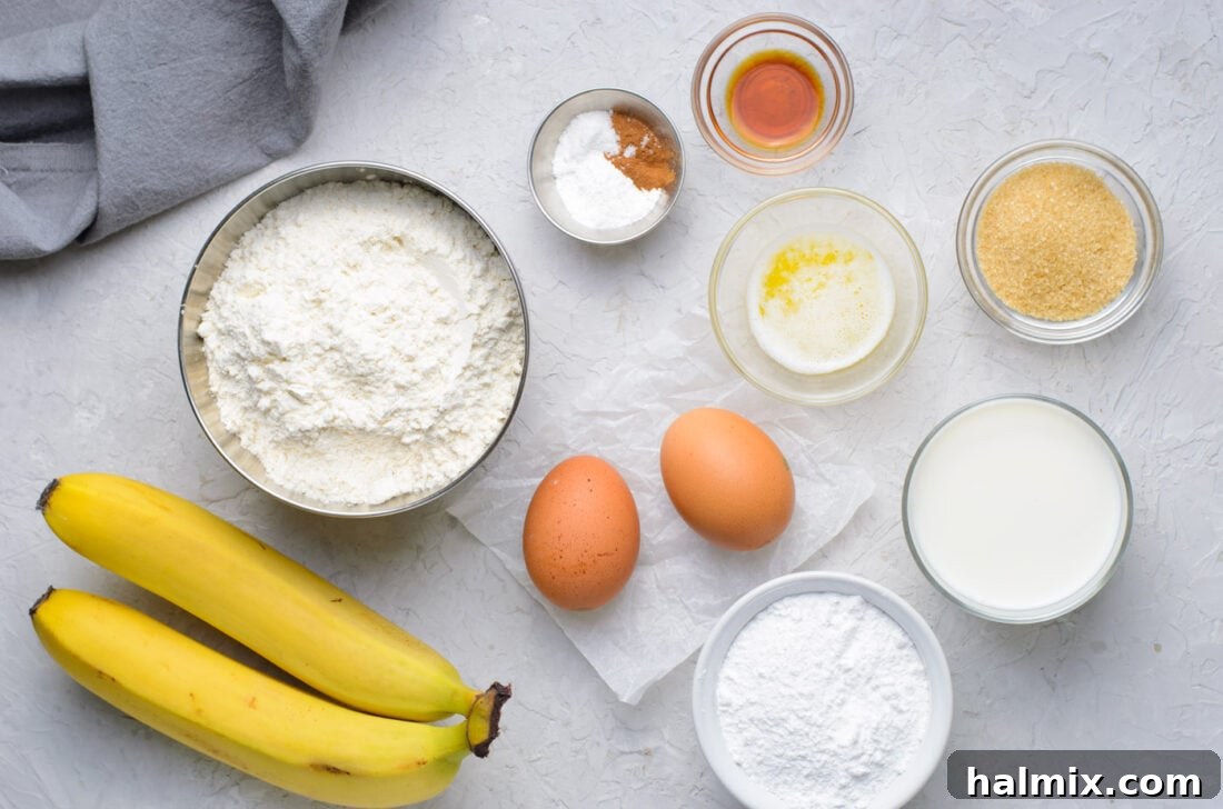 All the ingredients for banana fritters laid out on a kitchen counter.