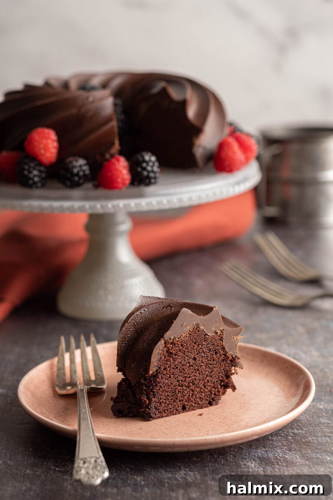 Decadent Chocolate Loaf 14 A delicious slice of Chocolate Pound Cake revealing its moist crumb and rich coating