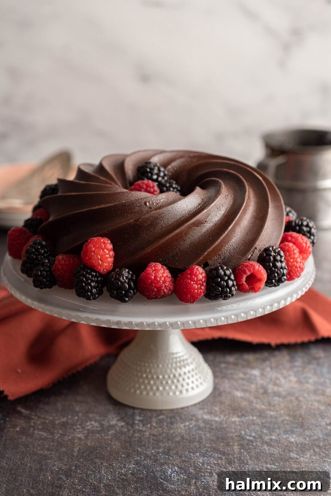 Decadent Chocolate Loaf 3 Decadent Chocolate Pound Cake presented on a beautiful cake plate