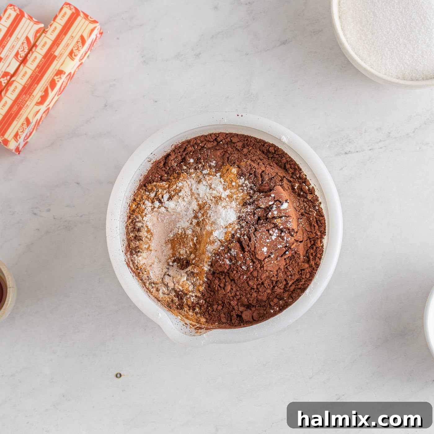 Decadent Chocolate Loaf 5 Dry ingredients for chocolate pound cake mixed in a bowl