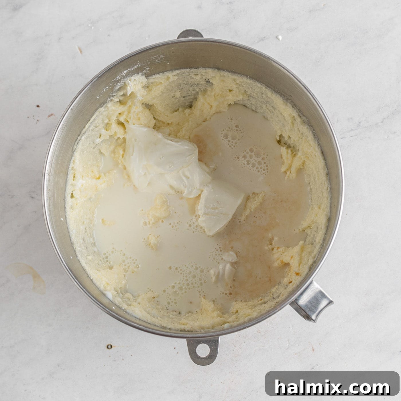 Decadent Chocolate Loaf 6 pound cake batter in a stand mixer bowl