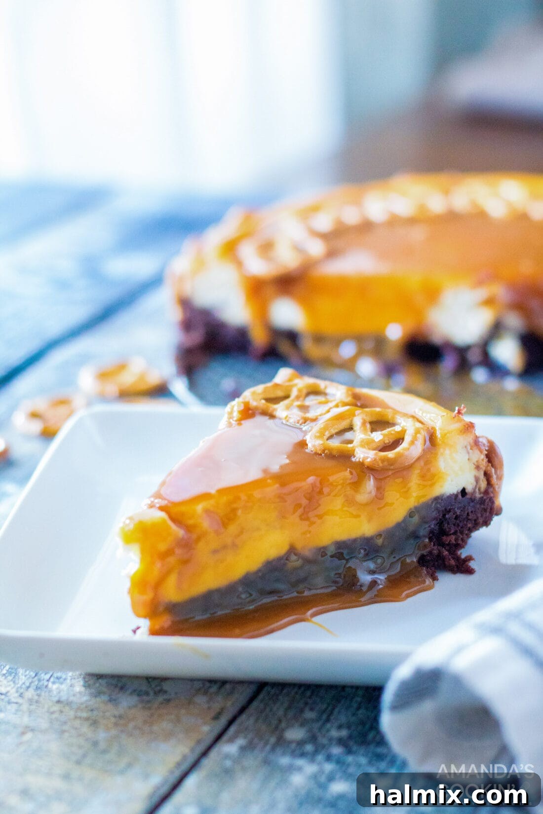 slice of Salted Caramel Cheesecake on a plate
