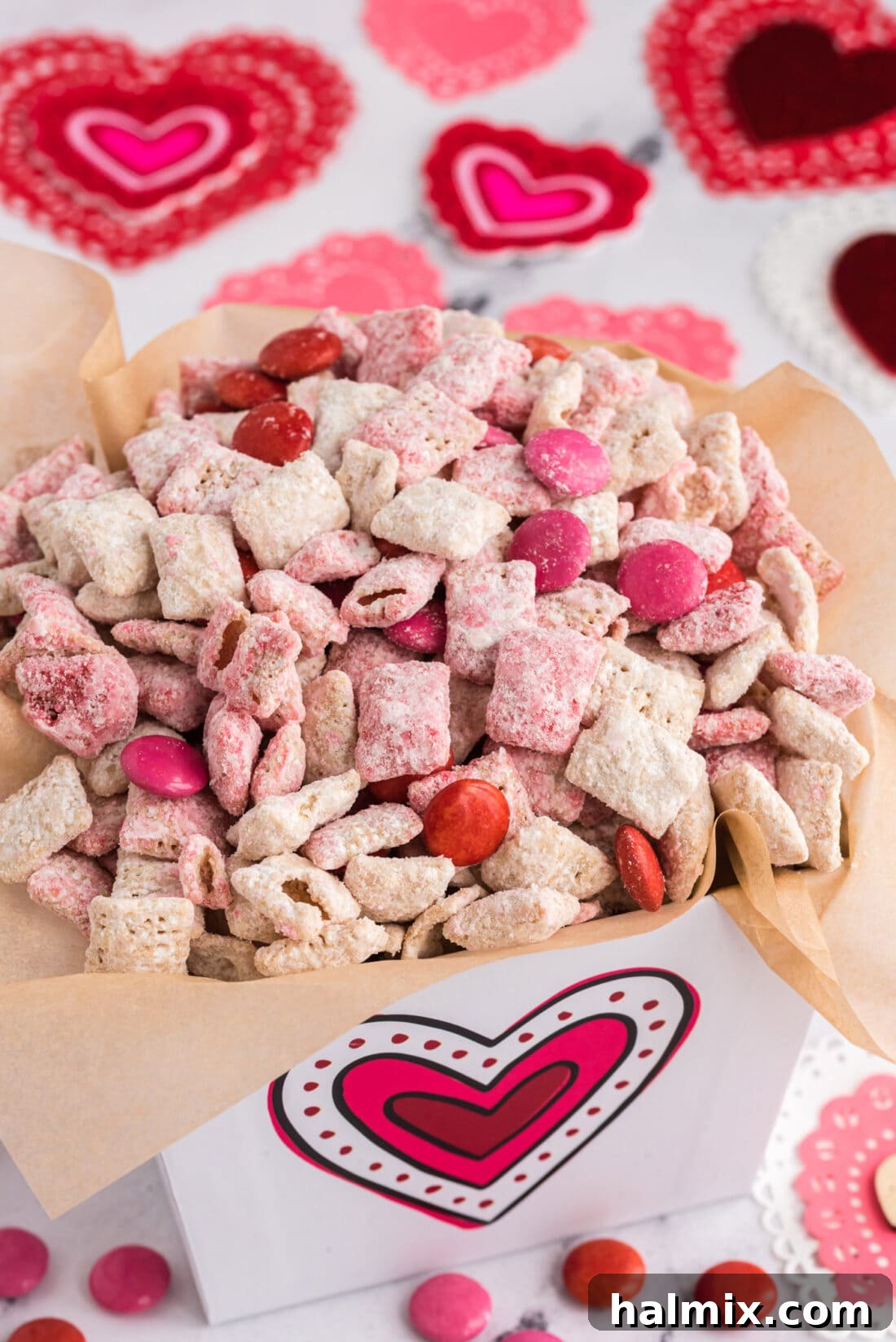 Valentine Muddy Buddies neatly packed in a cute gift box with a ribbon