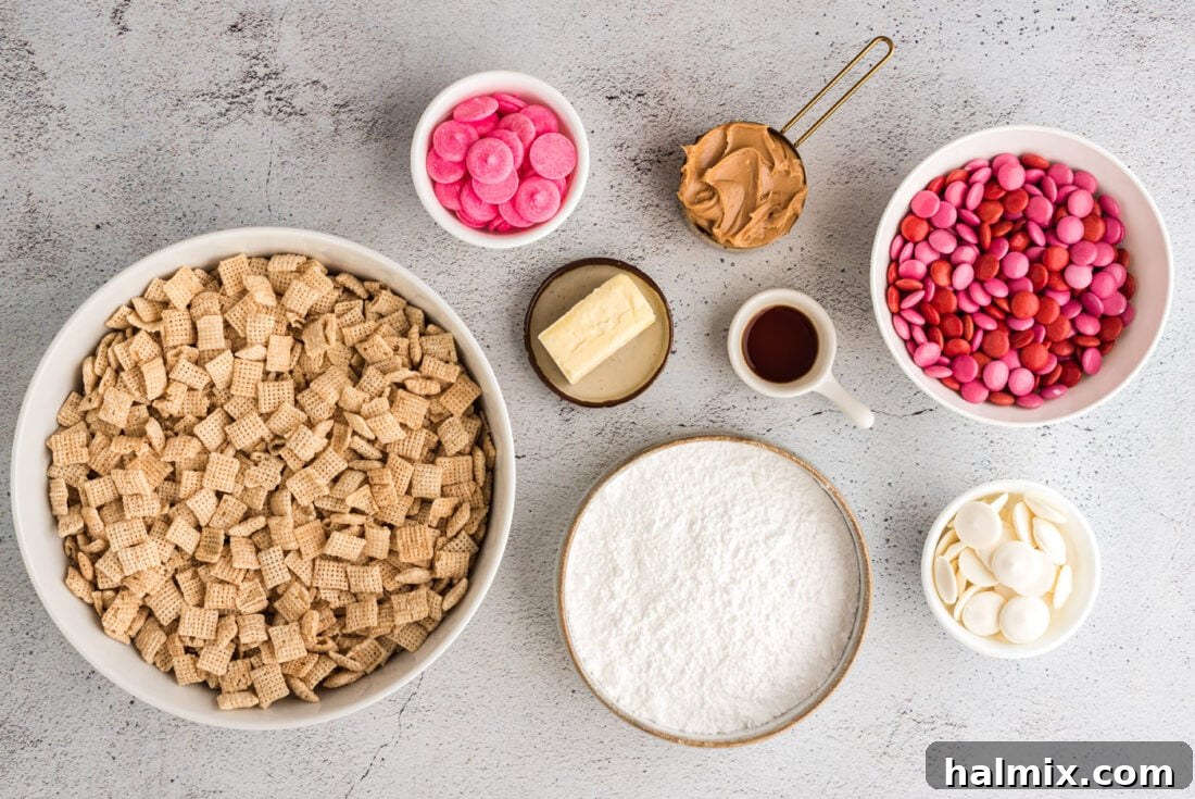 Collection of Valentine Muddy Buddies ingredients on a table