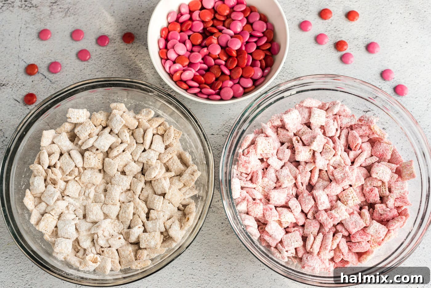 Close-up of white and pink muddy buddies with M&M's mixed in