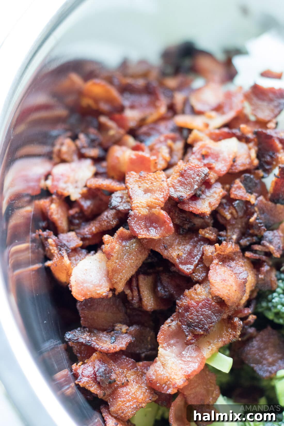 Creamy Broccoli Salad 5 Crispy diced bacon, prepared and ready to be added to the broccoli salad, showcasing its golden brown texture.